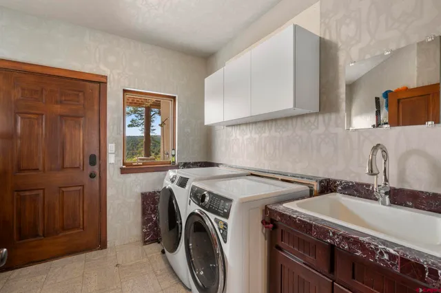 a utility room with dryer and washer