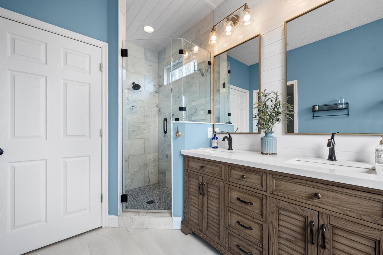 120 Menendez Road, Unit A St. Augustine, FL 32080 - Photo 20 of 50 a bathroom with a granite countertop sink mirror and double