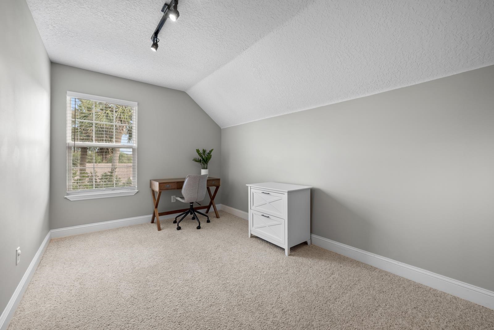 120 Menendez Road, Unit A St. Augustine, FL 32080 - Photo 28 of 50 a living room with furniture and a window