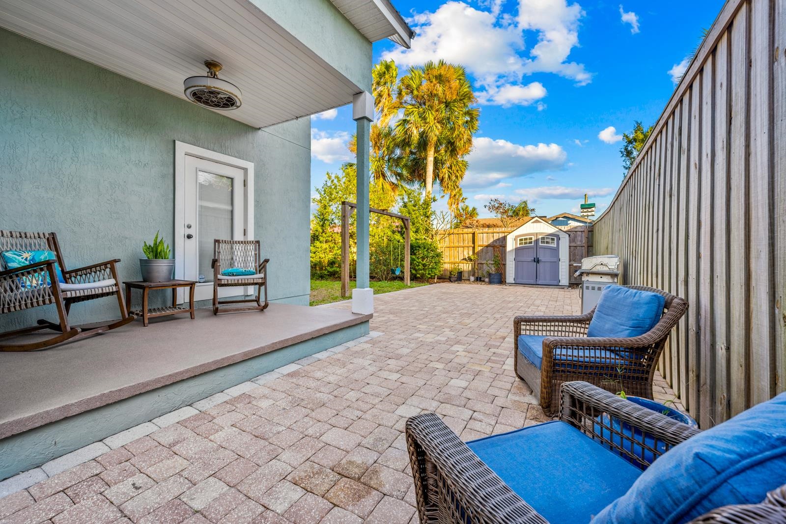 120 Menendez Road, Unit A St. Augustine, FL 32080 - Photo 31 of 50 a view of a patio with couches chairs and a potted plant