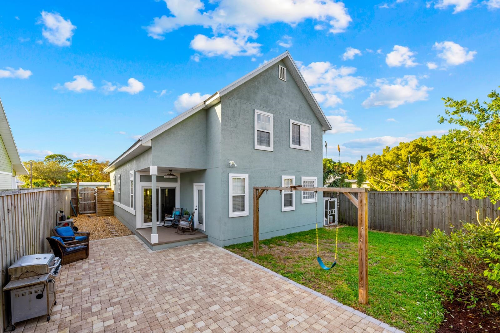 120 Menendez Road, Unit A St. Augustine, FL 32080 - Photo 33 of 50 a view of a house with backyard and sitting area
