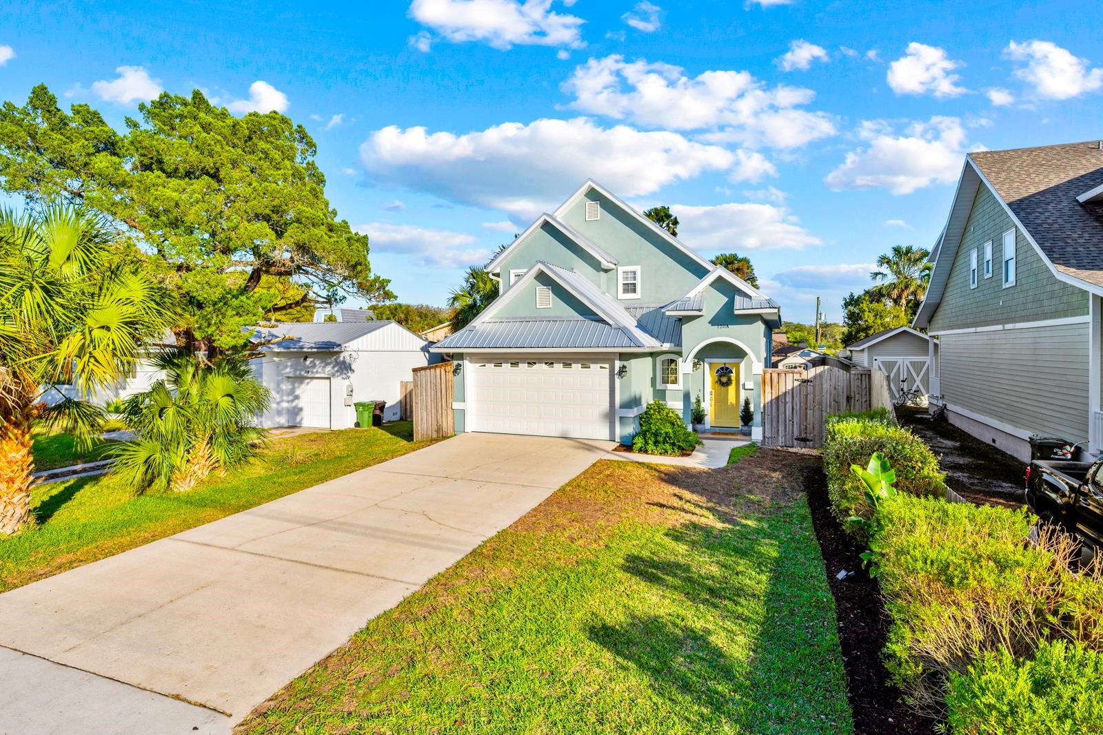 120 Menendez Road, Unit A St. Augustine, FL 32080 - Photo 36 of 50 a view of an house with backyard space and garden