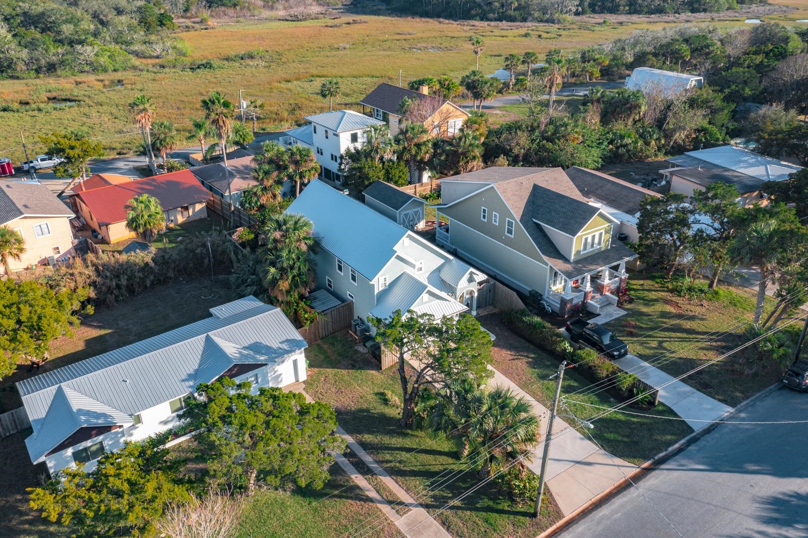 120 Menendez Road, Unit A St. Augustine, FL 32080 - Photo 48 of 50 an aerial view of residential houses with outdoor space