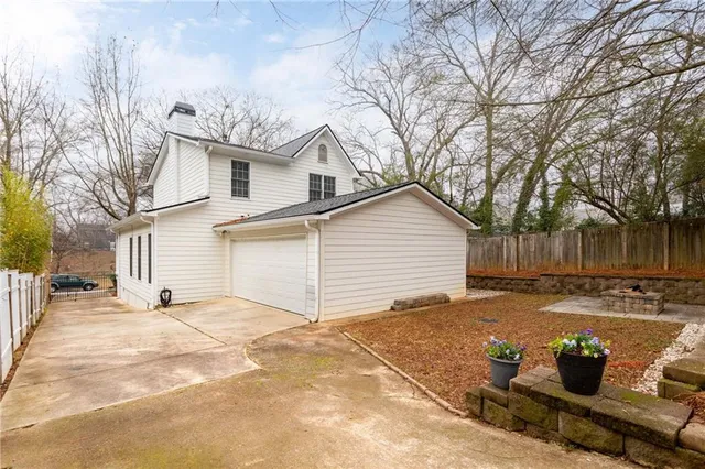 front view of a house with a chairs