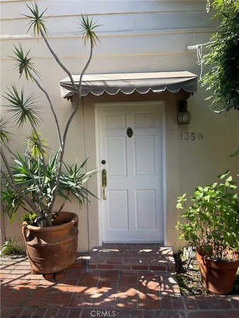 a view of an empty room and wooden floor