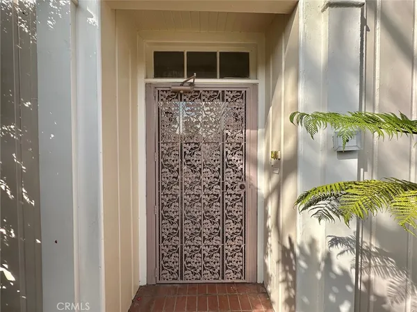 a view of a backyard with sitting area