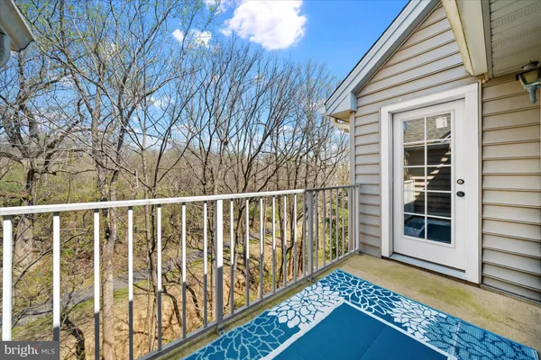 a view of a wooden house with a large window