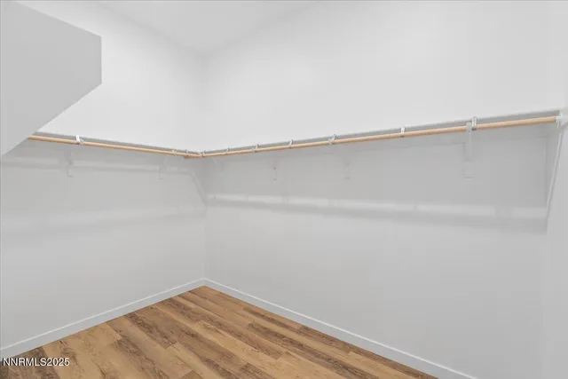 a view of a room with shelf on the wall