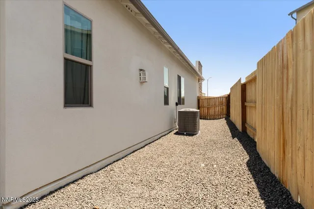 a view of a back yard from a balcony