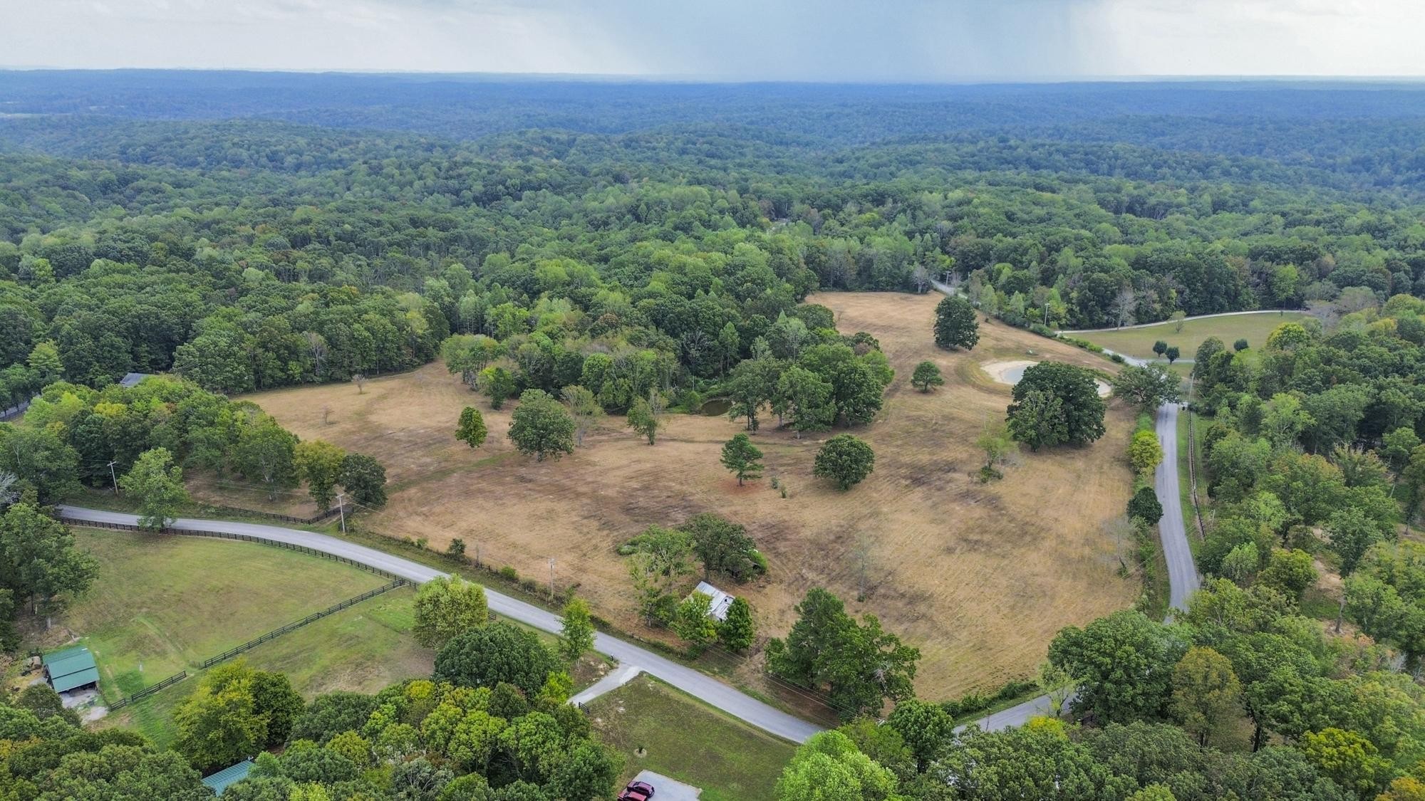 1165 B Mt Pleasant Road Kingston Springs, TN 37082 - Photo 3 of 5 an aerial view of a house with a yard