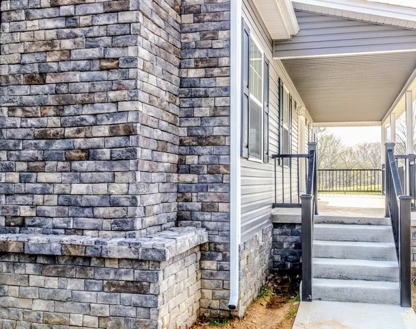 a view of yard with swimming pool