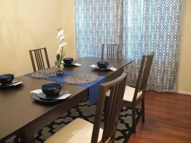 a table and chairs in a room