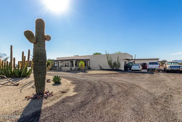 a front view of a house with parking space