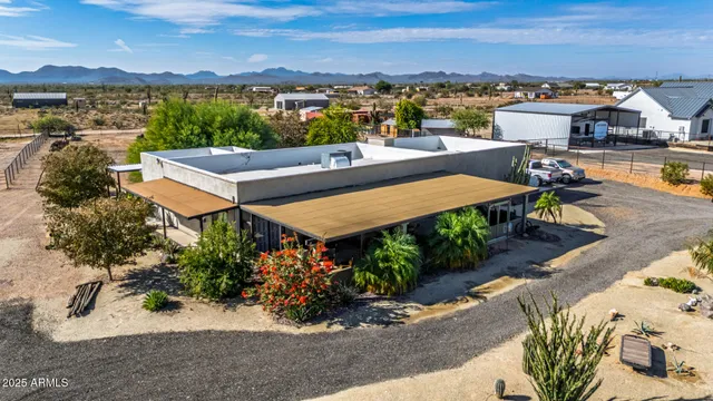 an aerial view of a house with a garden view