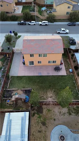 an aerial view of a house with garden space