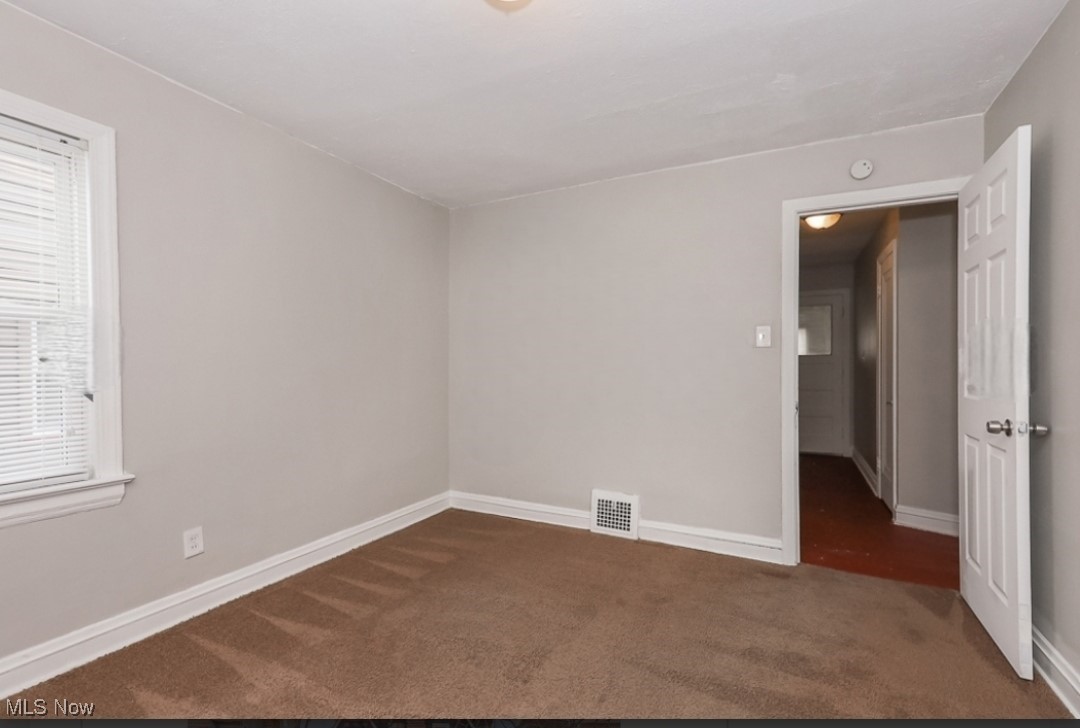 3649 Cummings Road Cleveland, OH 44118 - Photo 7 of 11 Empty room with carpet