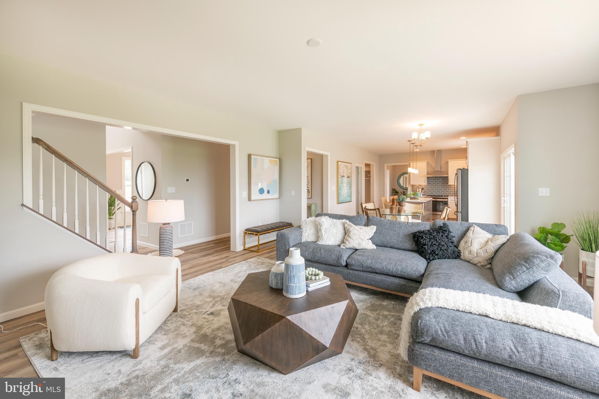 4 Old Orch Road Strasburg, PA 17579 - Photo 11 of 25 a living room with furniture and a large window
