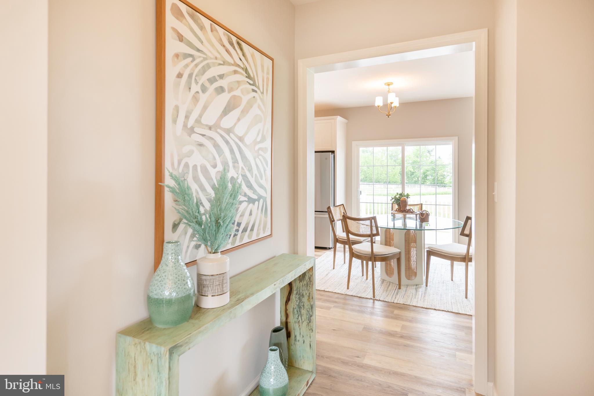 4 Old Orch Road Strasburg, PA 17579 - Photo 14 of 25 a view of a dining room with furniture and wooden floor