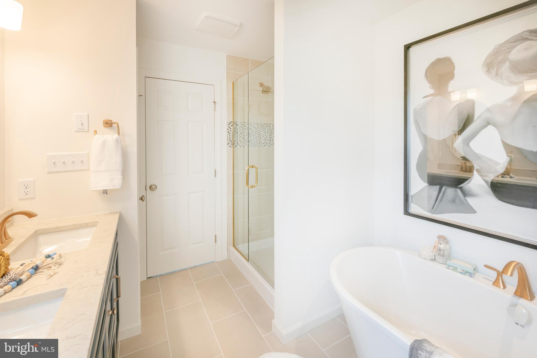 4 Old Orch Road Strasburg, PA 17579 - Photo 19 of 25 a bathroom with a tub sink and mirror