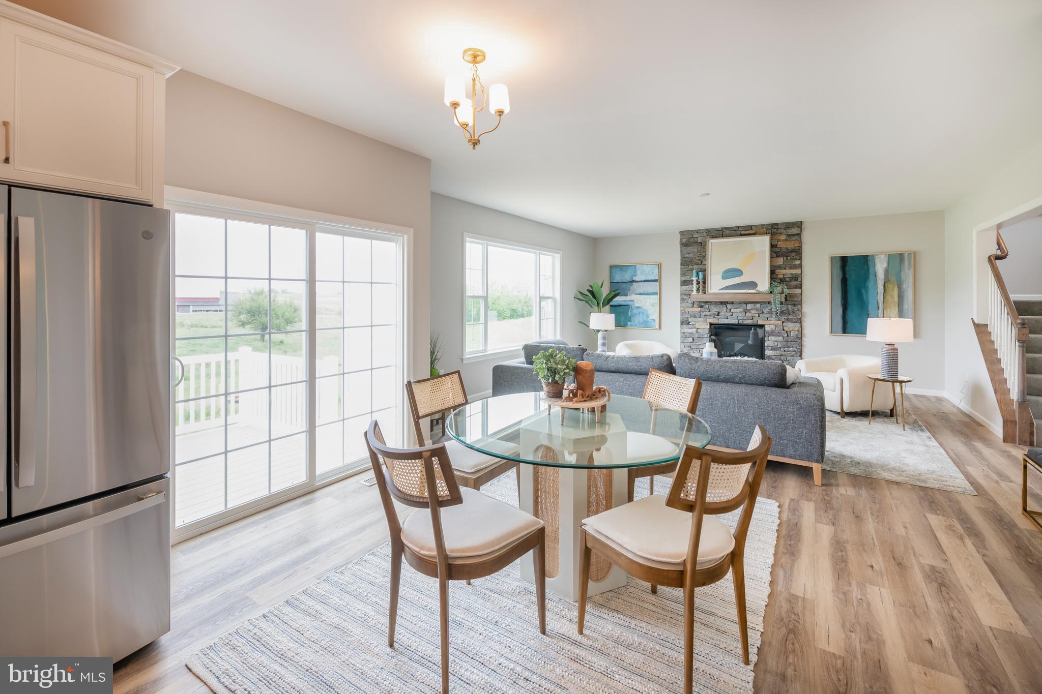 4 Old Orch Road Strasburg, PA 17579 - Photo 6 of 25 a view of a dining room with furniture window and wooden floor