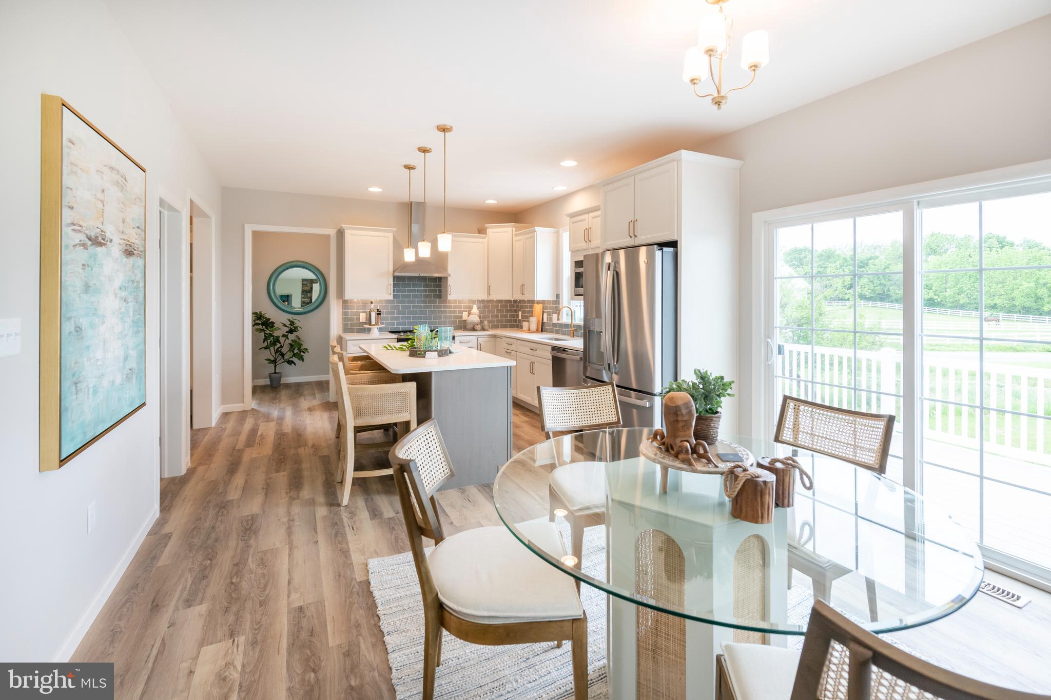 4 Old Orch Road Strasburg, PA 17579 - Photo 7 of 25 a view of a dining room with furniture window and outside view