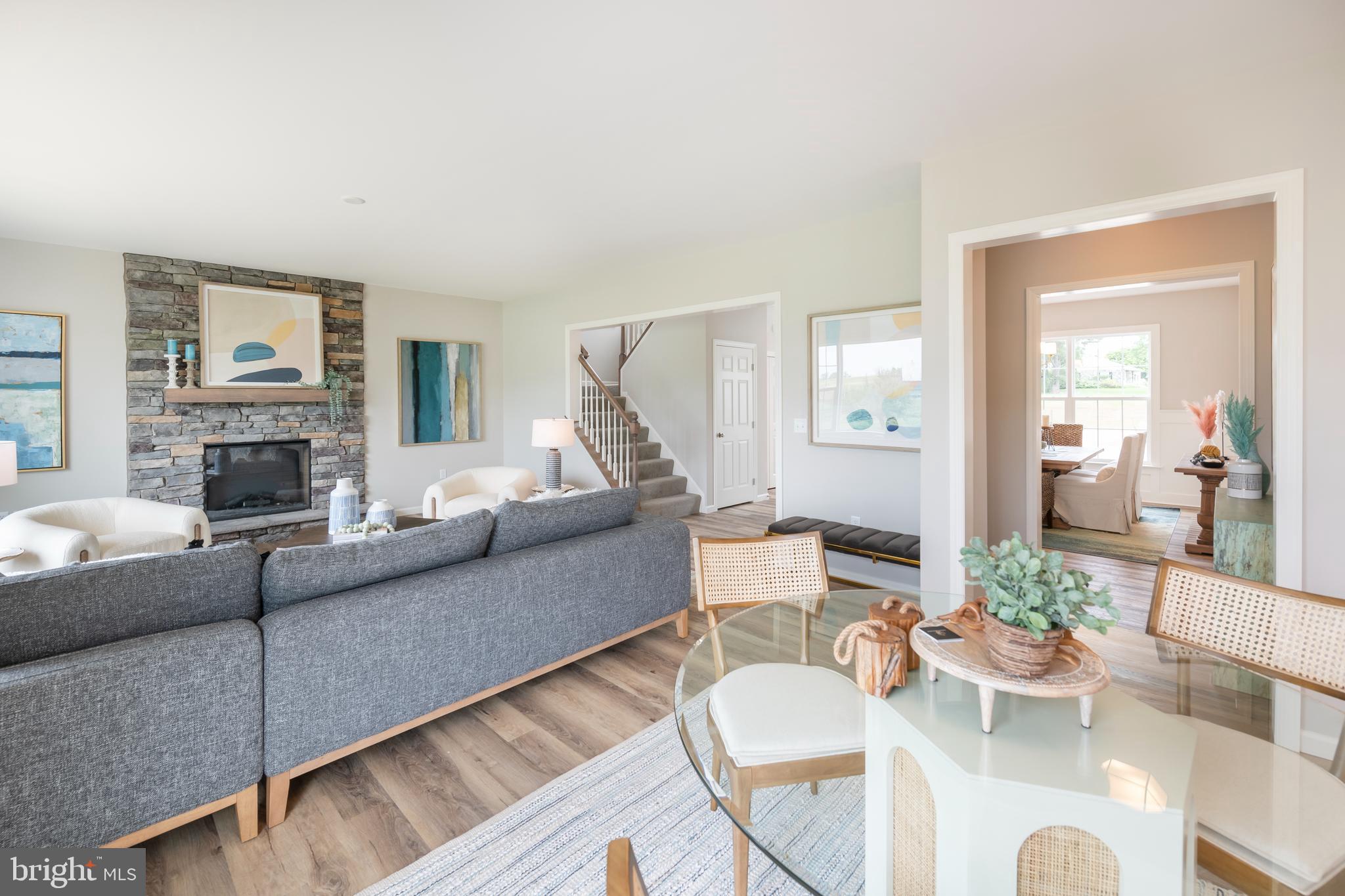 4 Old Orch Road Strasburg, PA 17579 - Photo 8 of 25 a living room with furniture and a fireplace