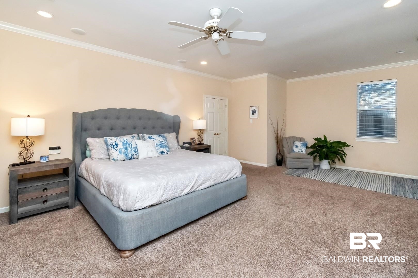 1050 Southern Way Court Mobile, AL 36609 - Photo 13 of 36 Carpeted bedroom with ornamental molding and ceiling fan