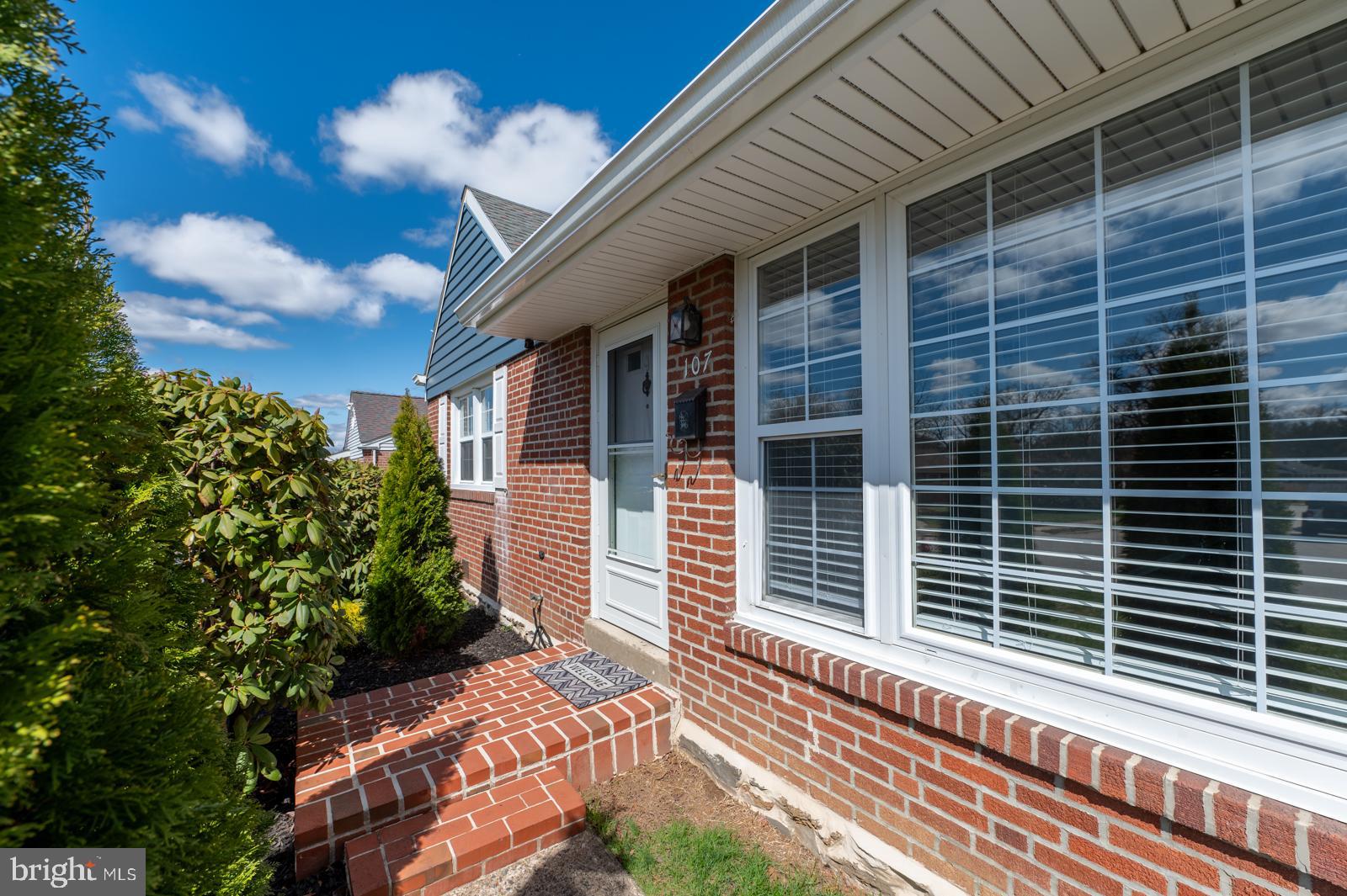 107 Valley View Road Norristown, PA 19401 - Photo 5 of 35 a view of a house with a yard and potted plants