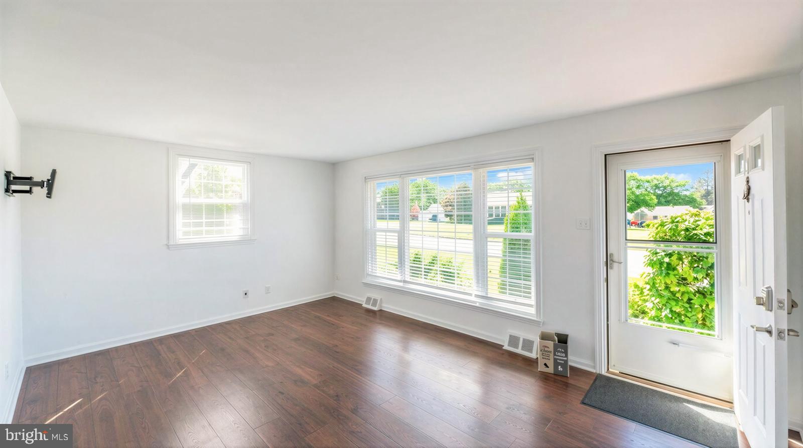 107 Valley View Road Norristown, PA 19401 - Photo 6 of 35 a view of a room with wooden floor and windows