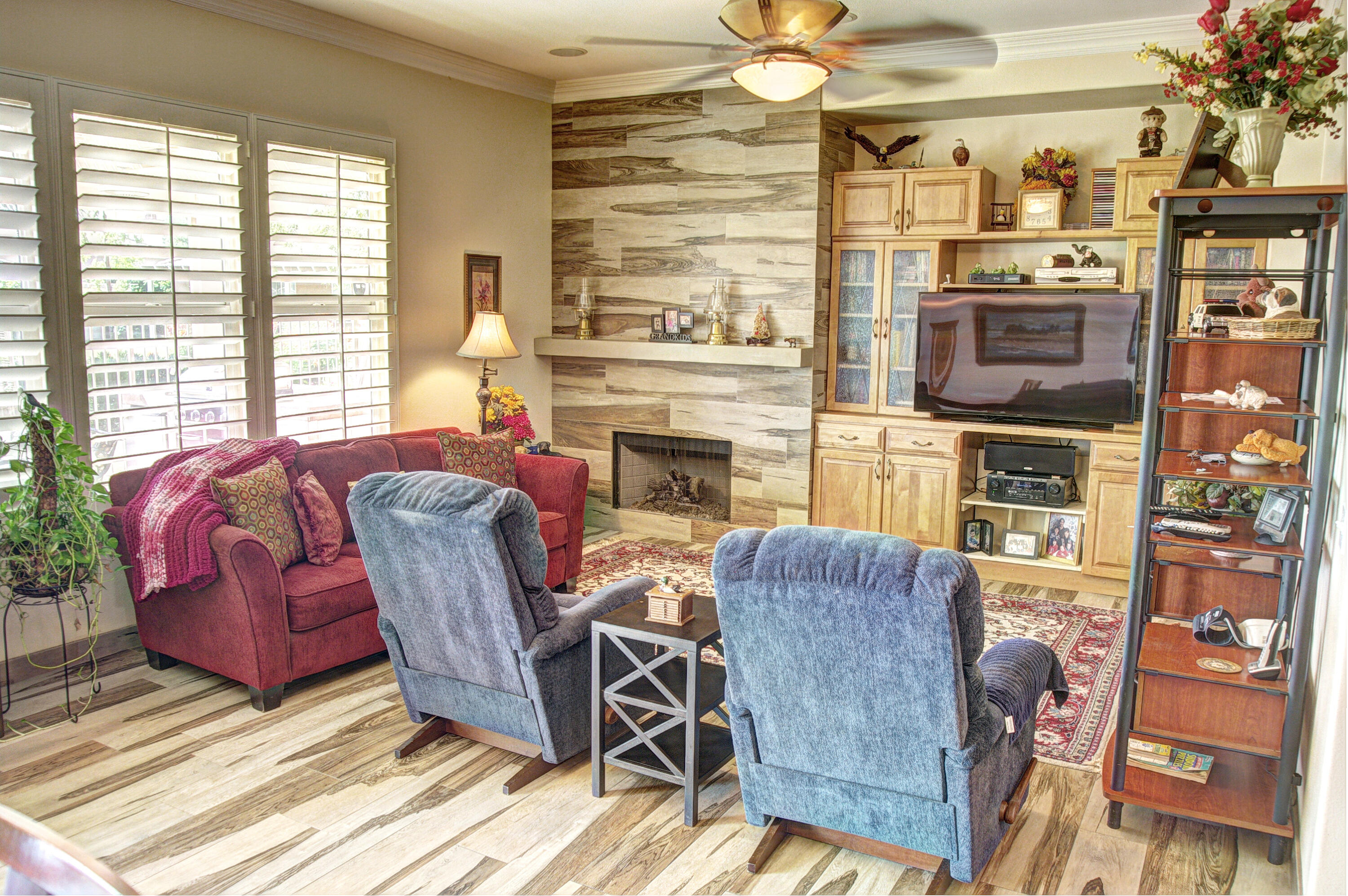 49714 Newman Circle Indio, CA 92201 - Photo 14 of 42 a living room with furniture and a fireplace