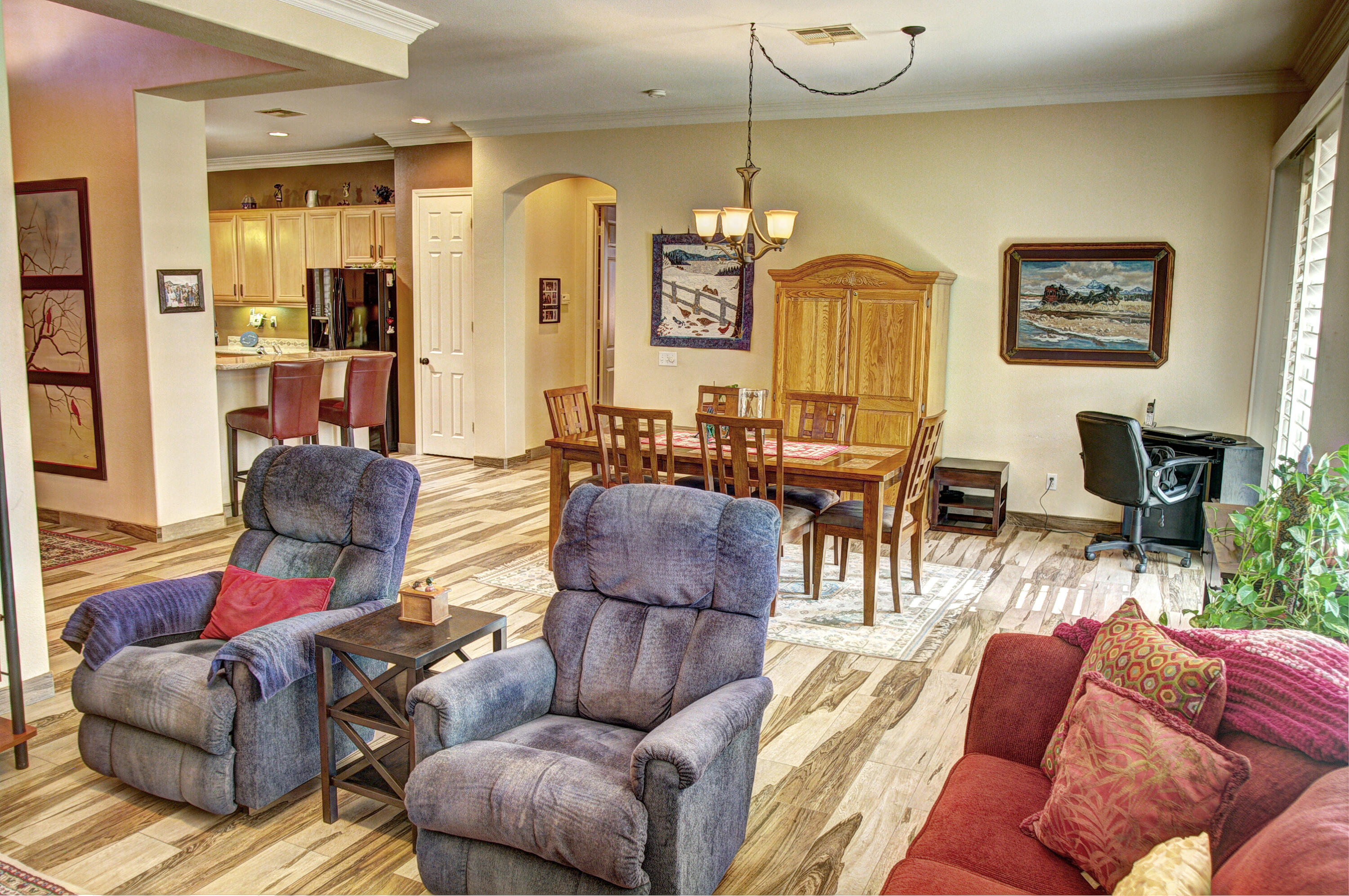 49714 Newman Circle Indio, CA 92201 - Photo 16 of 42 a living room with furniture and wooden floor
