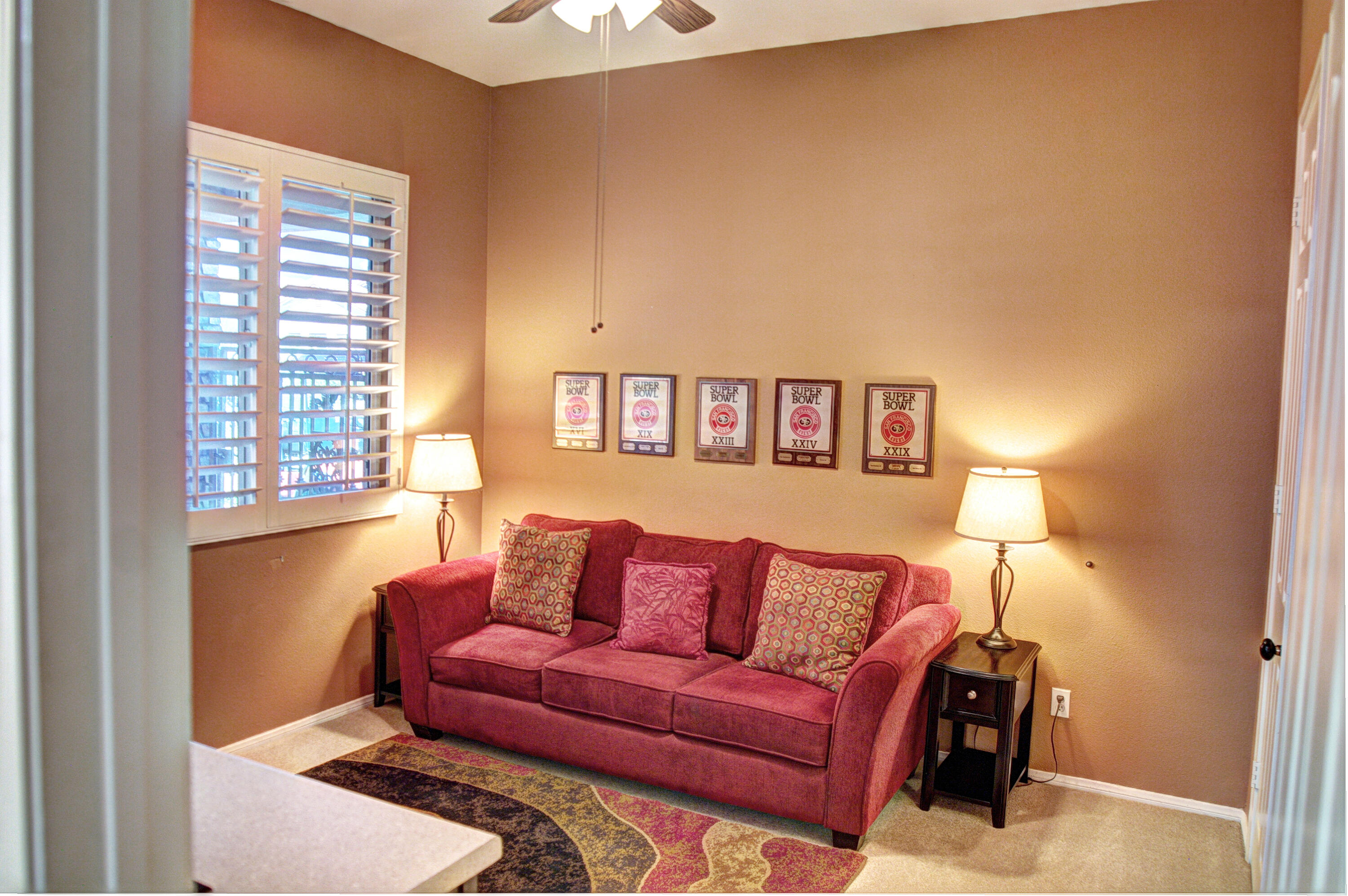 49714 Newman Circle Indio, CA 92201 - Photo 22 of 42 a living room with furniture and a window