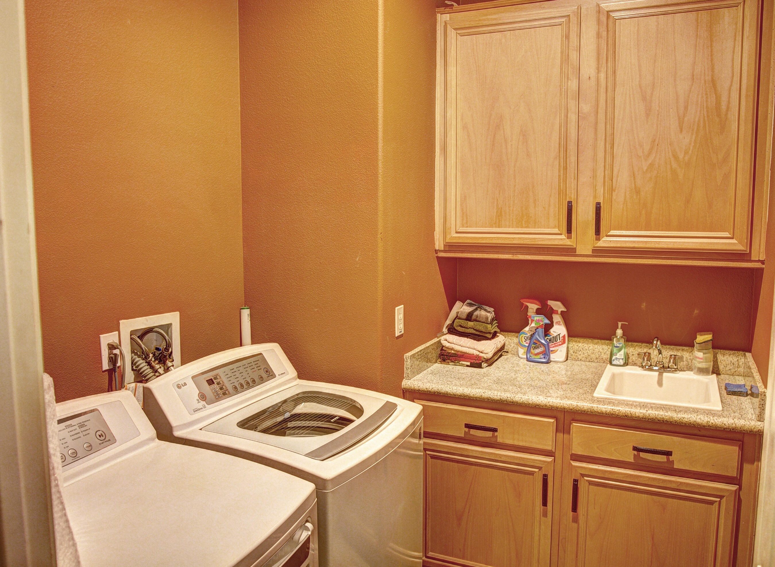 49714 Newman Circle Indio, CA 92201 - Photo 25 of 42 a close up of a utility room with washer and dryer