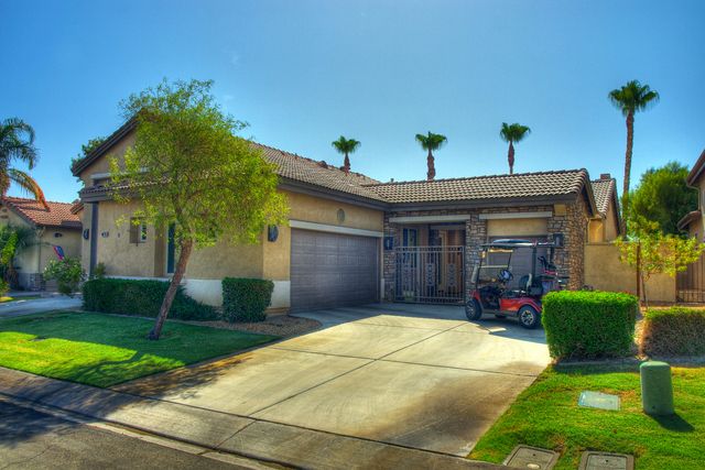 a house view with a garden space