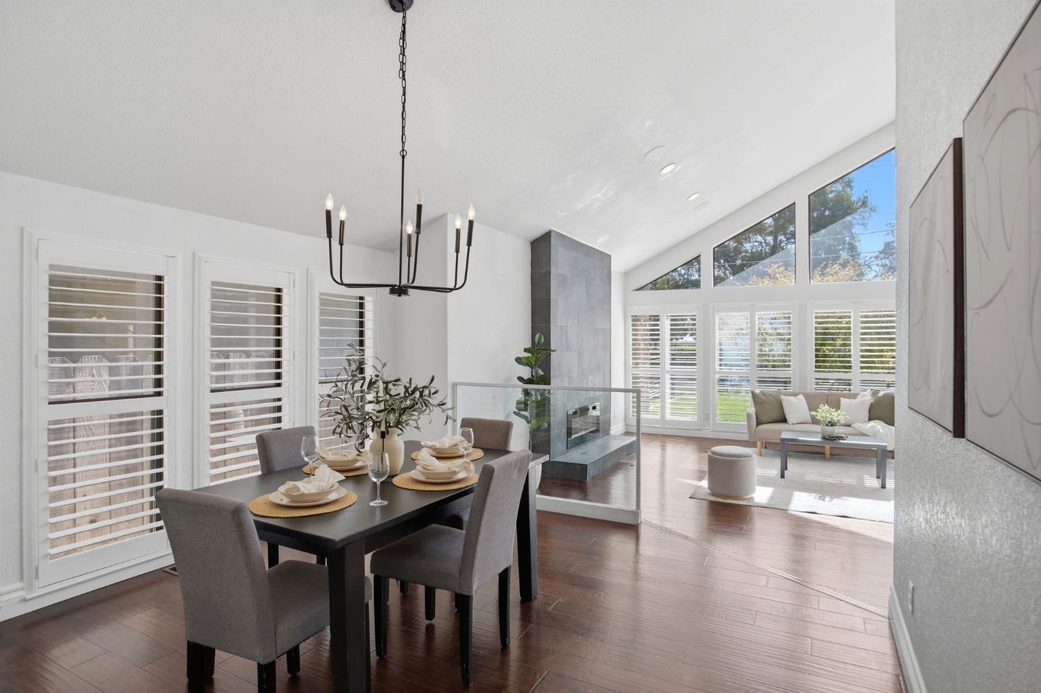 10401 Golf Link Road Turlock, CA 95380 - Photo 10 of 63 a view of a dining room with furniture window and wooden floor