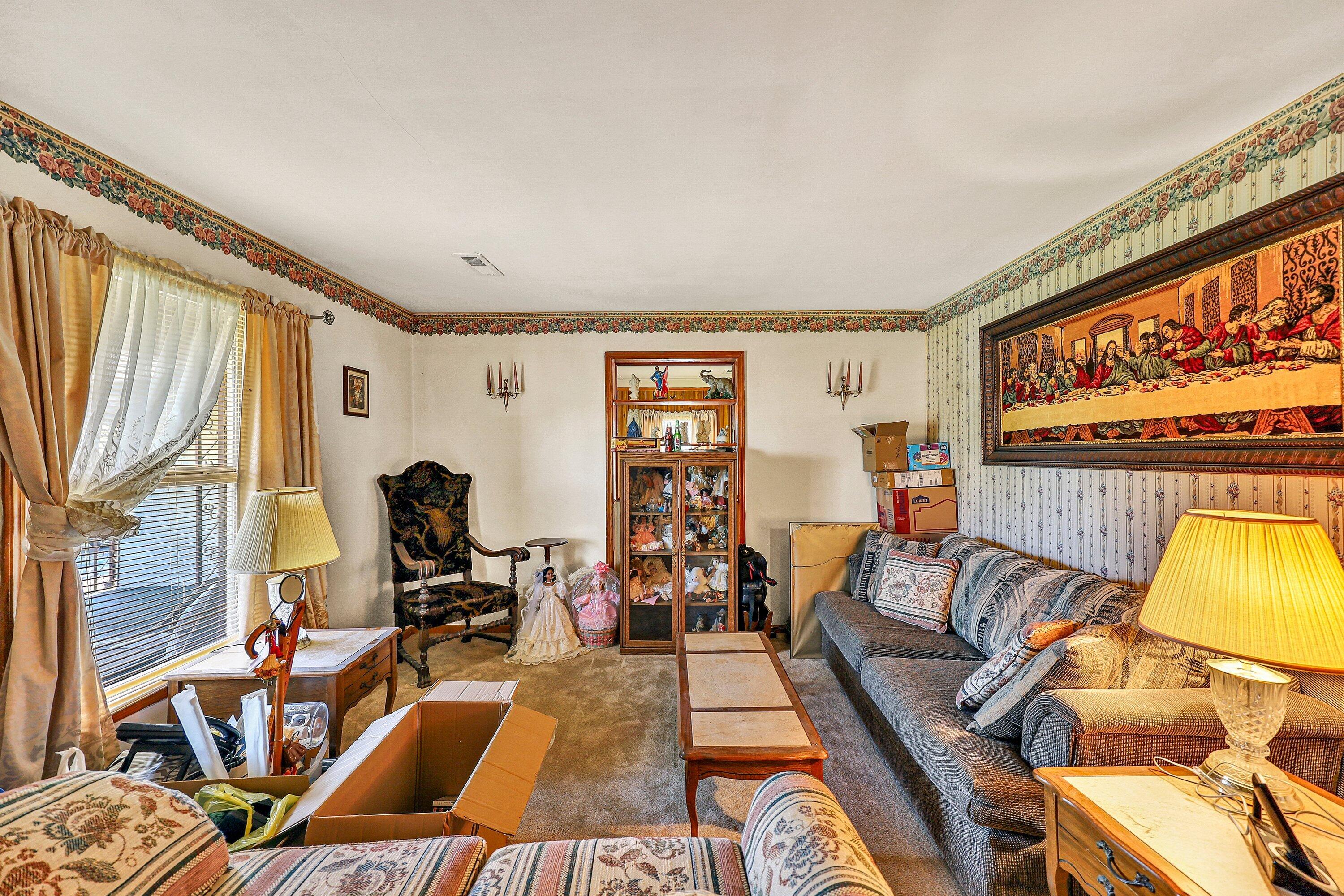 509 Carver Road Martinsville, VA 24112 - Photo 11 of 25 a living room with furniture and a large window