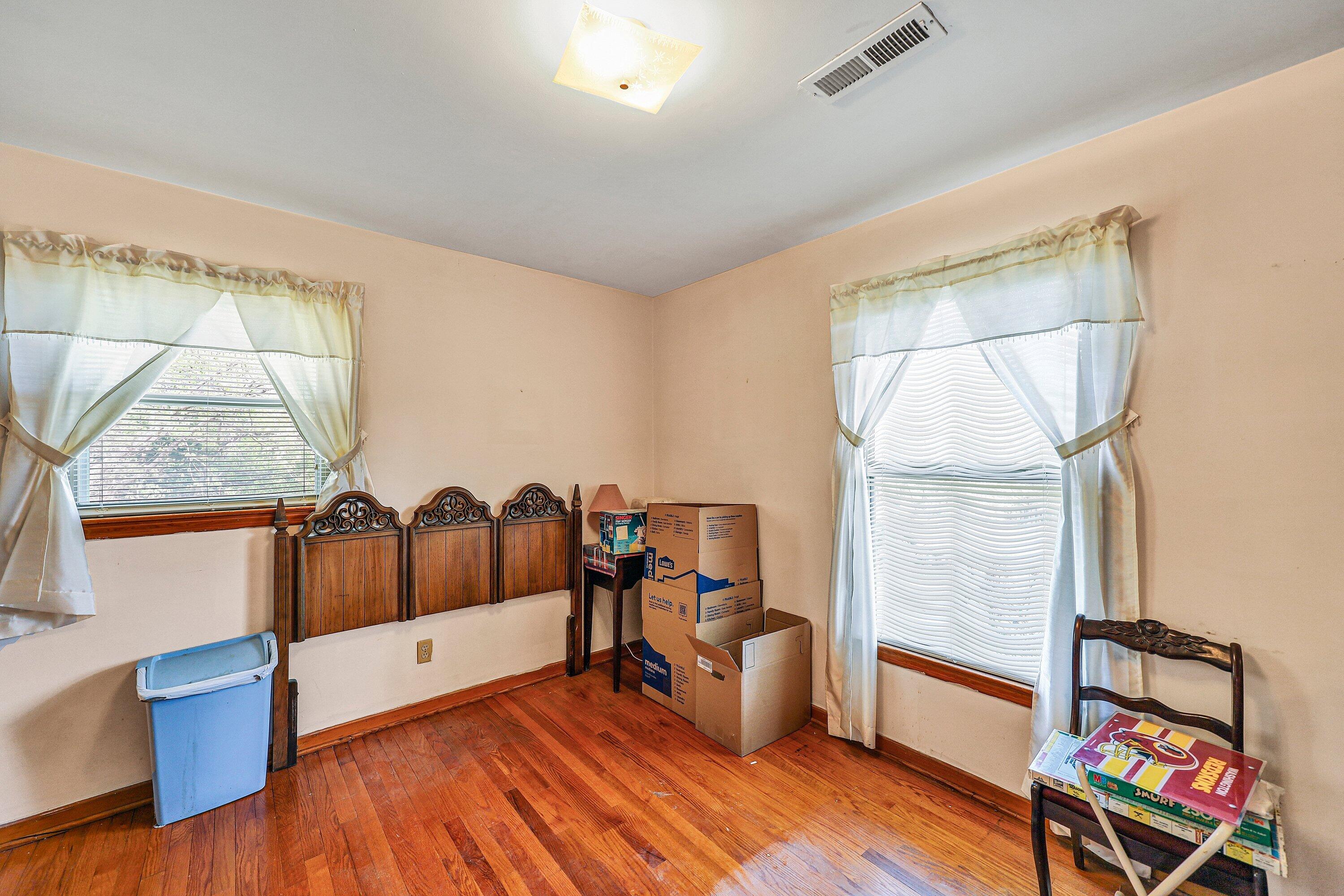 509 Carver Road Martinsville, VA 24112 - Photo 14 of 25 a living room with furniture fireplace and wooden floor
