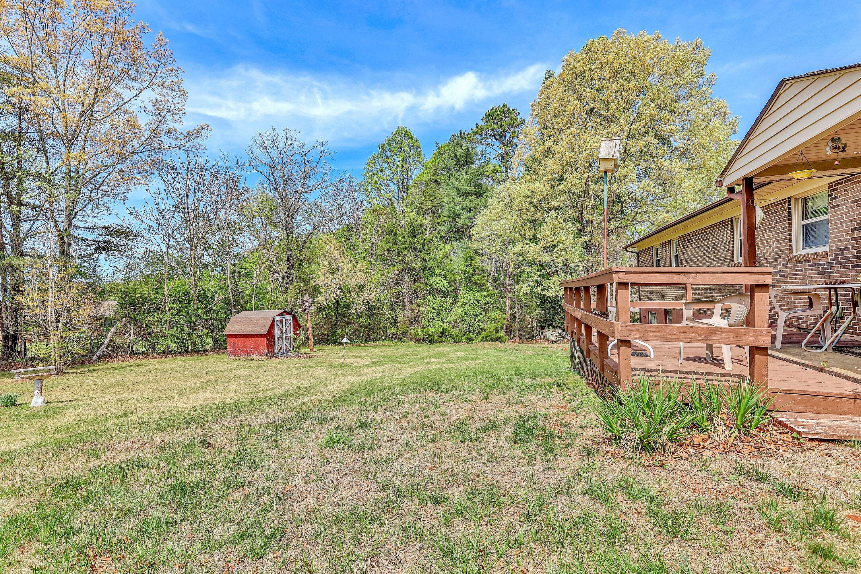 509 Carver Road Martinsville, VA 24112 - Photo 23 of 25 a view of a house with a yard and sitting area