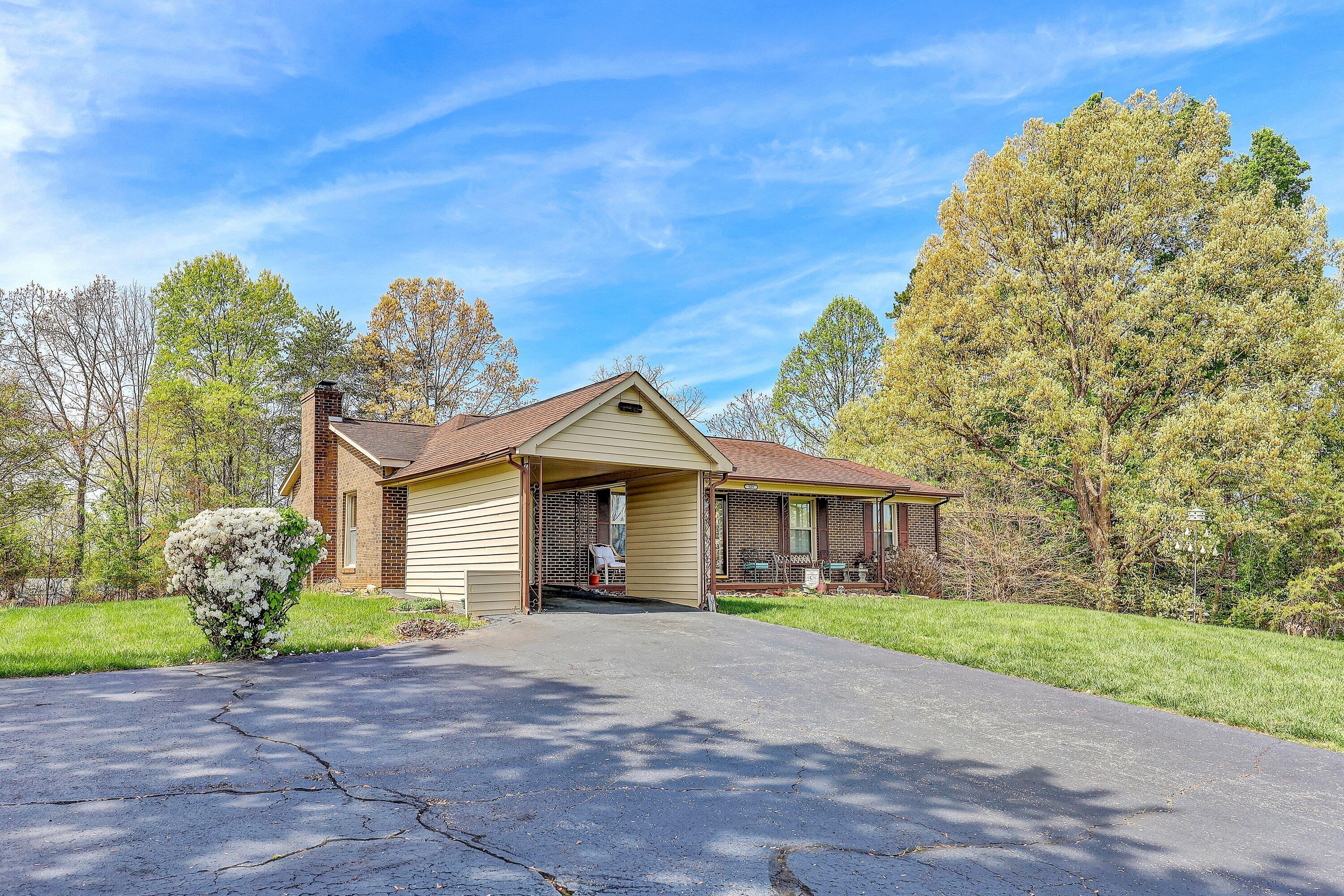 509 Carver Road Martinsville, VA 24112 - Photo 25 of 25 a front view of a house with garden