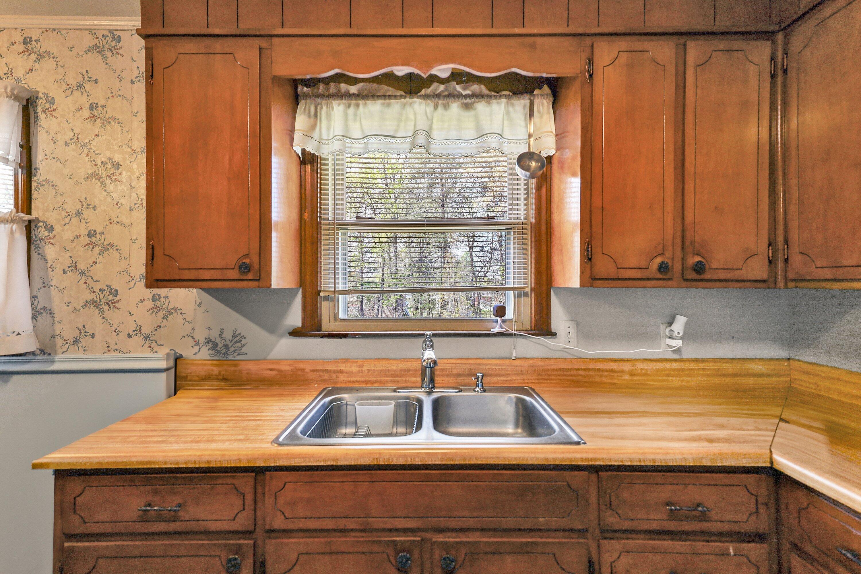 509 Carver Road Martinsville, VA 24112 - Photo 7 of 25 a view of a sink and a window