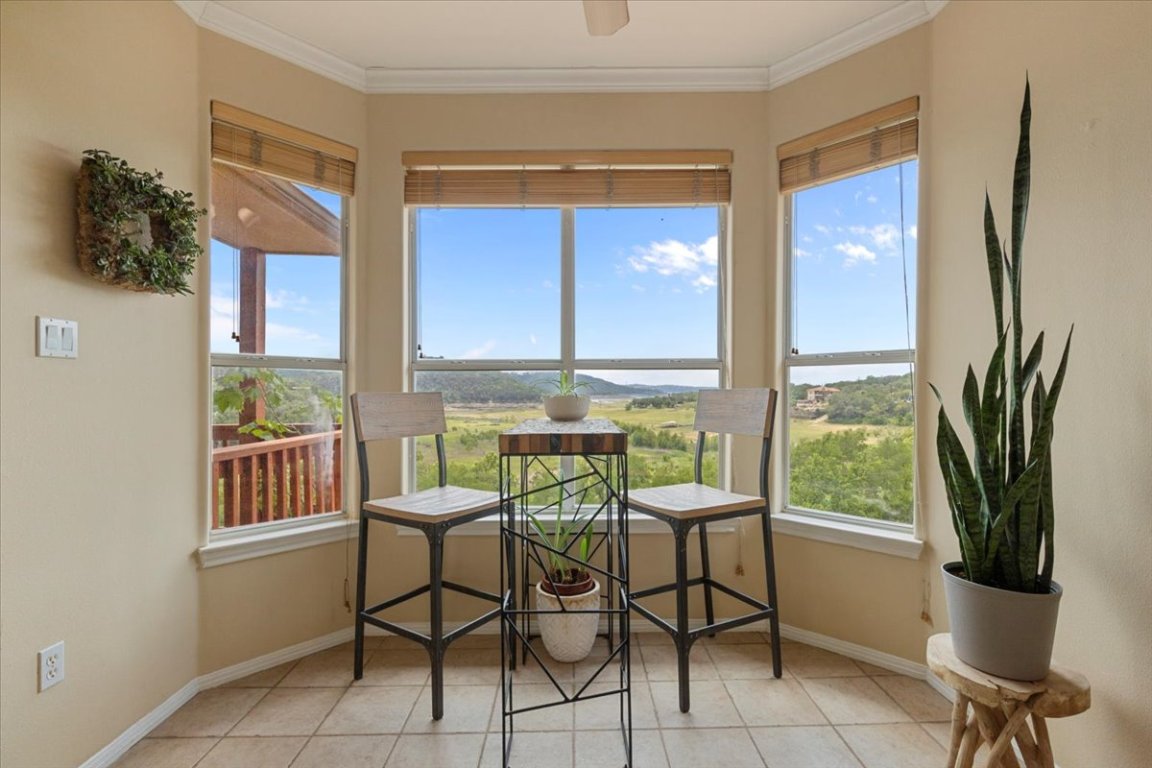 13612 Bullick Hollow Road Austin, TX 78726 - Photo 12 of 34 a view of a dining room with furniture window and outside view