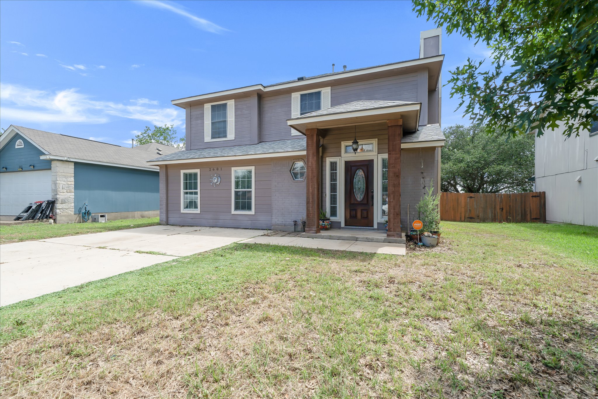 2601 Highcloud Drive Lockhart, TX 78644 - Photo 2 of 30 a view of a house with a yard and plants