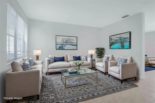 a living room with furniture and a couch