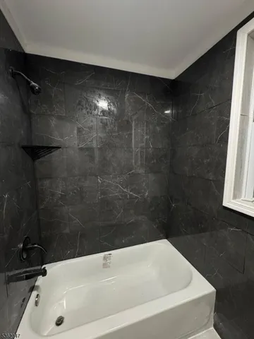 a bathroom with a bathtub