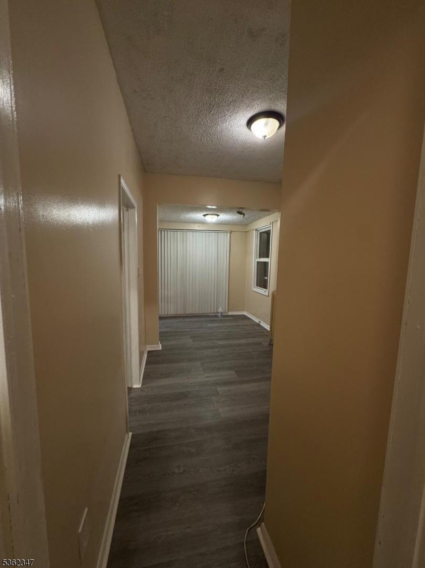 388 East 9th Avenue, Unit 2 Roselle, NJ 07203 - Photo 15 of 24 a view of gallery with wooden floor