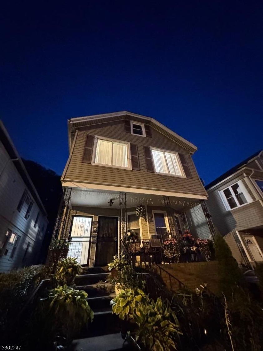 388 East 9th Avenue, Unit 2 Roselle, NJ 07203 - Photo 2 of 24 a front view of a house