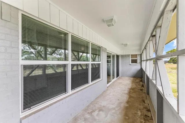 a view of a large body of water with a building in the background
