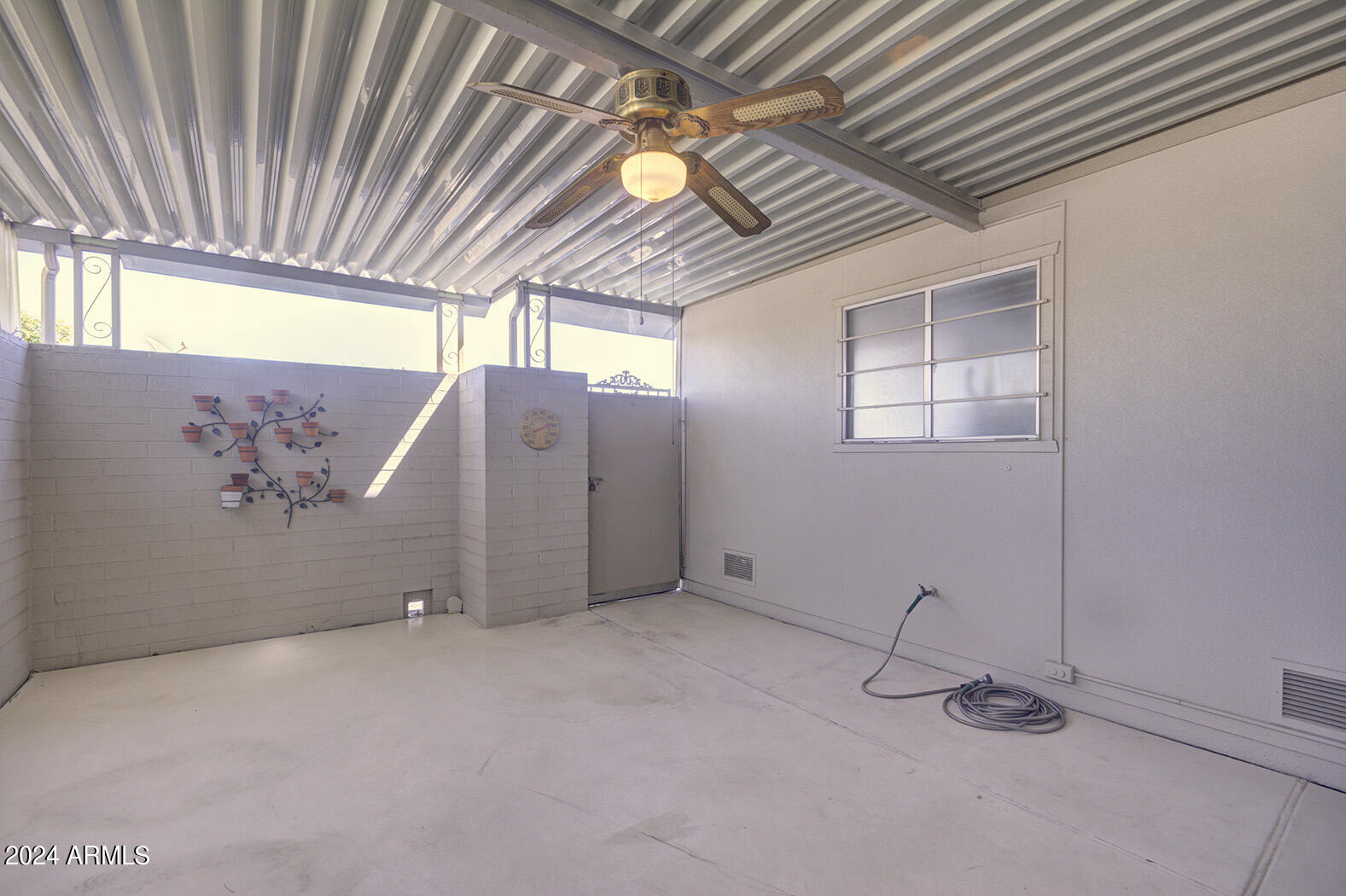10050 West Royal Oak Road, Unit H Sun City, AZ 85351 - Photo 11 of 13 Patio 2