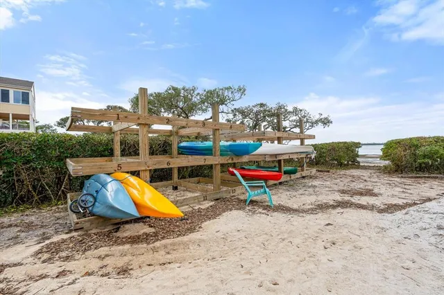 a view of a yard with furniture and sitting area