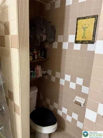 a view of an empty room and fire place